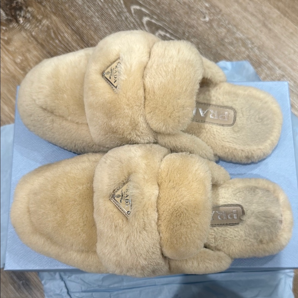 Prada Shearling Mules (in White/Cream)